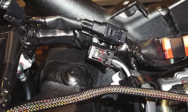 R Bracket 28 On the right side of the bike just inside the frame and above the starter, locate and unplug the BLACK 4-pin connector for the right O2