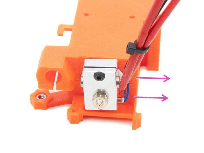 Close the Hotend with the Extruder cover and tighten it by: M3x25 (1x) M3x18 (1x)