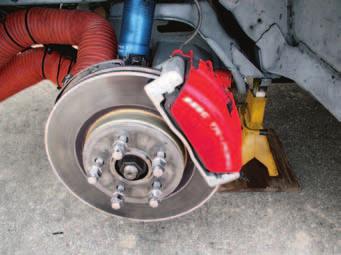 Lift the caliper away from the rotor and disconnect the parking brake cable. 4. Slide the rotor off the hub. Caliper Mounting Bracket & Rotor Installation 1.