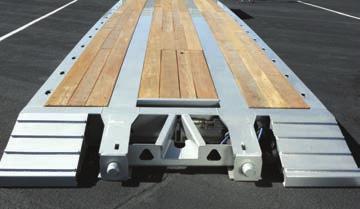 ) Removable decking in front 6 of center bay reveals storage area for outriggers, etc.