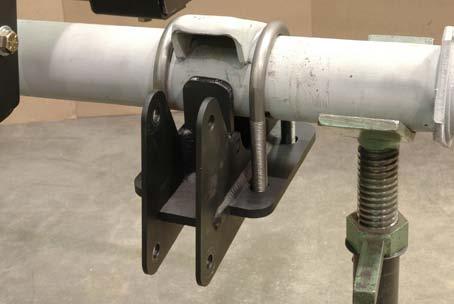 Loosely bolt the 4-link bracket to the axle housing using the