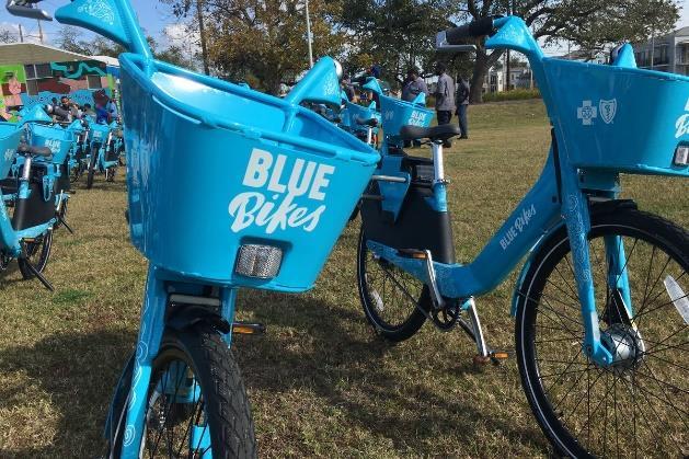 BIKE SHARE Bike share is a system of publicly shared bicycles available for temporary use by members or daily users. Bicycles are located at stations ( docks ), or hubs around the city and region.