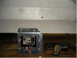 3. INSTALL CONTROL BOX AND WIRING. a. Mount control box w/ bracket part number 101035 or 101036. b. Mount leading edge of the bracket in line with the pump mount bracket as shown.