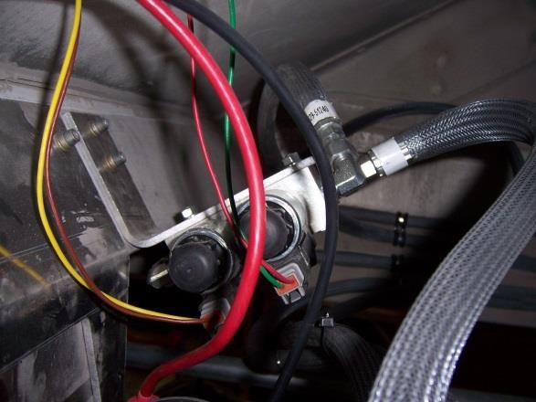 vii. Connect the plug with the yellow/brown wires of wiring harness 031-52586 to the lower valve on