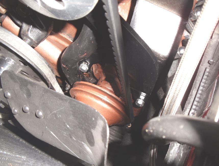 Now from under the vehicle, install the supplied tubing clamp around the column tube and the column support bracket. Make sure there are no binding issues with the support bracket and the column tube.