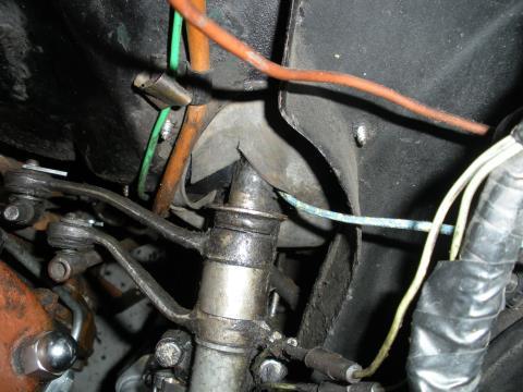 4. Route supplied horn wire through the firewall connecting the horn