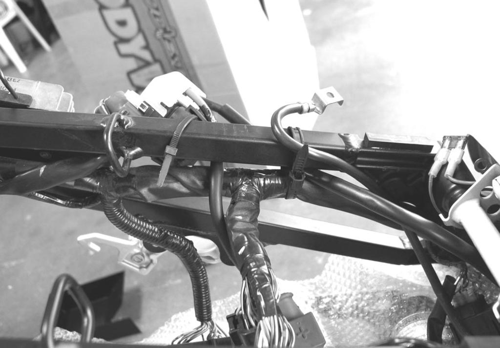 2) Route all wiring and fuses on inside left edge subframe as shown in the