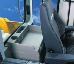 Large-sized cab Adjustable steering column Operator s seat, adjustable in