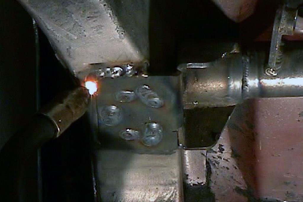 Re-install the upper shock crossmember, and weld it in place as shown in Figure 2. Figure 2 Weld Crossmember 8.