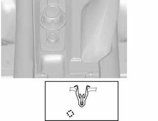 disengage clip A, clip B and the hook from the rear console in order to make space under