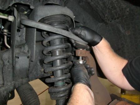 upper control arm and remove ball