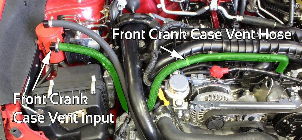 Remove clamp from hose by using a small screw driver under the tab and twisting to free clamp. Remove OEM crank case vent hose from white connector and route toward AOS.