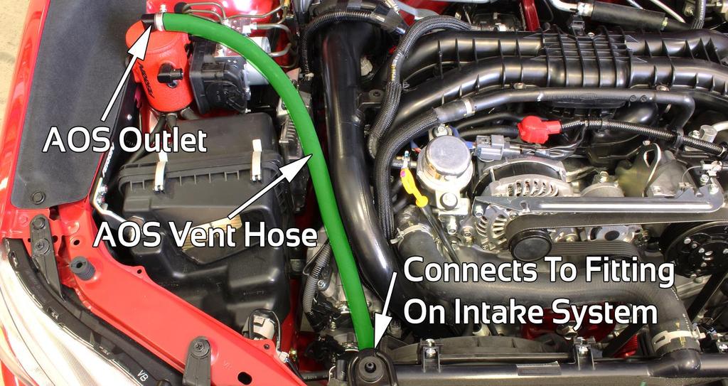 a. Route previously installed 5/8 hose (installed during step 10 to intake) to top fitting on AOS. Trim hose to length and secure with hose clamp.
