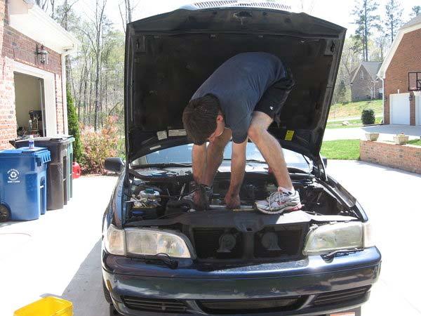 Don't do this Now, you can start un-doing the 10mm intake bolts. Start with the lower 4 first, but do NOT remove them.