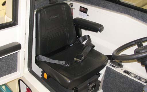 OPERATION OPERATOR SEAT The operator seat has two adjustments. The adjustments are for the front to rear seat position and ride stiffness. The front to back adjustment lever adjusts the seat position.