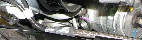 Use a 6mm Allen tool to hold the tie rod ball stud stationary while using an 18mm