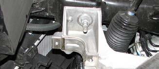 Use a 13mm socket to remove the lower brake modulator bracket bolts. 66.