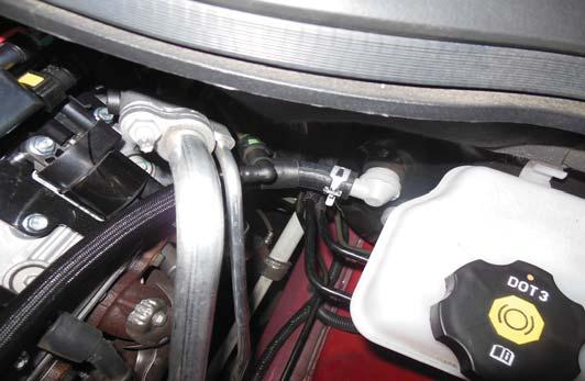 186. Plug the brake booster valve back into the brake booster grommet.