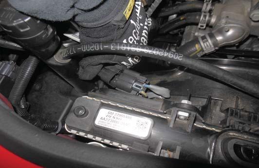 Also place towels below the radiator end of the upper radiator hose, remove
