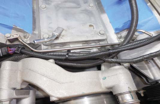 Connect the provided throttle position control extension harness to the OEM throttle control put on