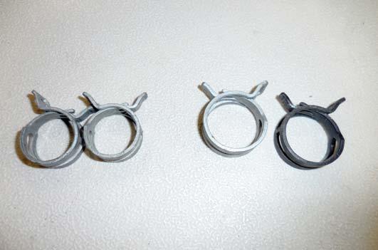 104. Here are the four OEM heater hose clamps. There are two small, and two large clamps. 105.