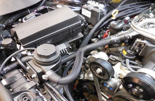 Connect the end of the Reservoir to Supercharger hose without the fi tting to the upper (inside) hose barb on the