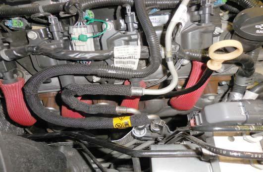 connection next to the fuel line on the right hand side of the engine