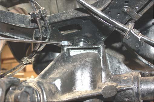 Remove the top sway bar bolt using a 15mm wrench/socket. See Photo 1. Retain the factory hardware for reuse. 4.