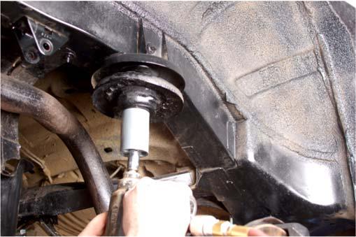 Slighlty lower rear axle enough to allow installation of control arm bracket.