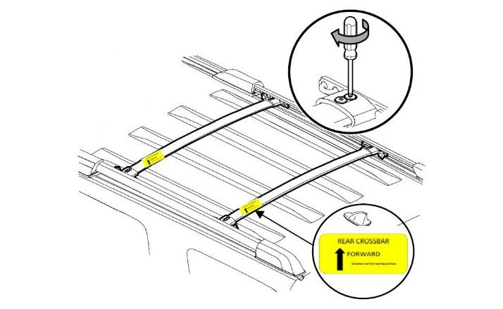 Tie-down loops (d) Slide the cross bars into the rails with the tiedown loops toward the center of the vehicle (Fig. -4).