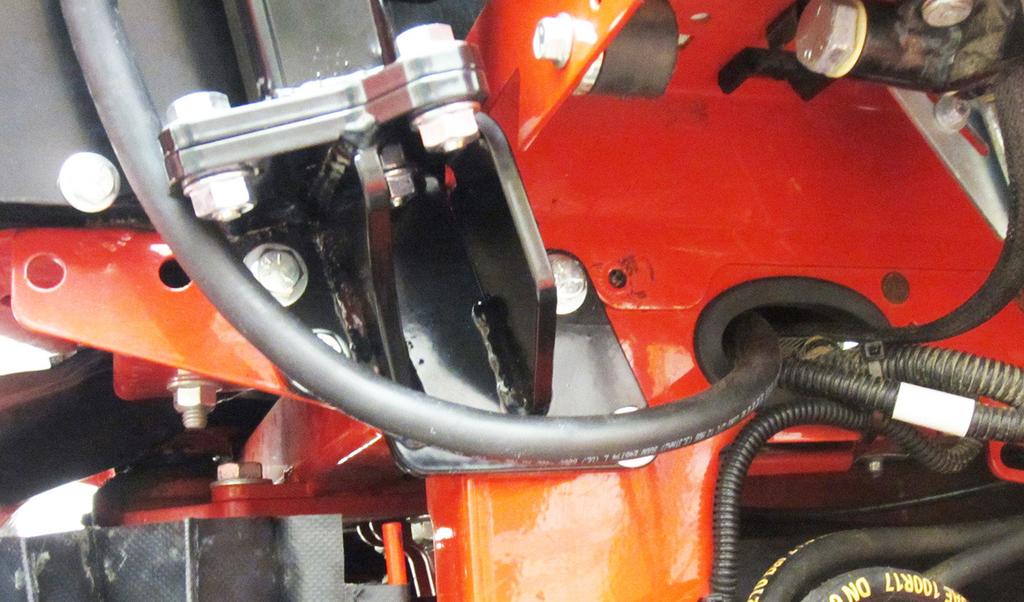 Tighten the six / bolts that fasten the right and left rear weather cab posts to the rear cab frame mounts.
