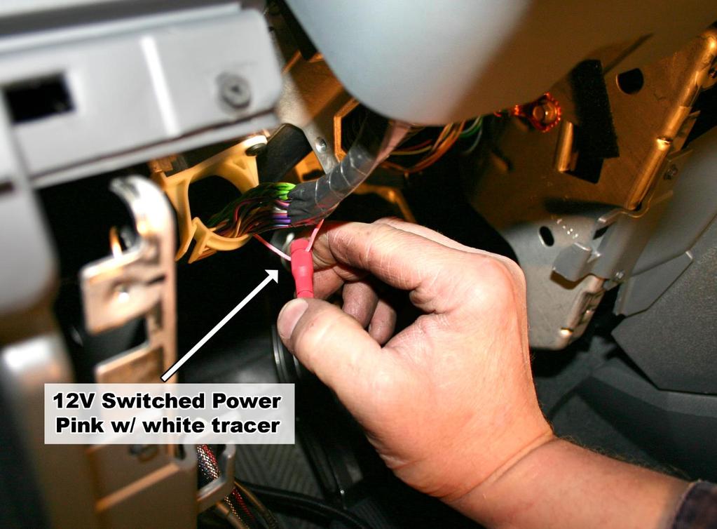 With a test light, locate a switched 12 Volt power source (quite frequently a pink w/ white tracer wire) and install the supplied black (12-18ga) Posi-Tap to it then attach the red
