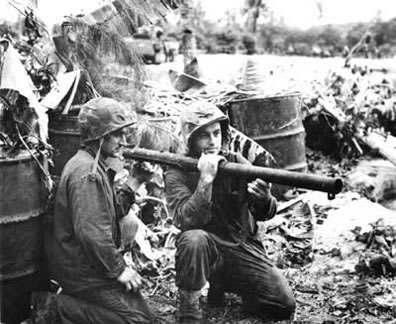BAZOOKA Bazooka BFG 1 24 Piercing 4, Blast D3, Move or Shoot (left) Pfc Lauren Kahn (R) and Pfc Lewis Nalder (L) pose with their M1 bazooka after the Japanese attack on 17 Jun 44.