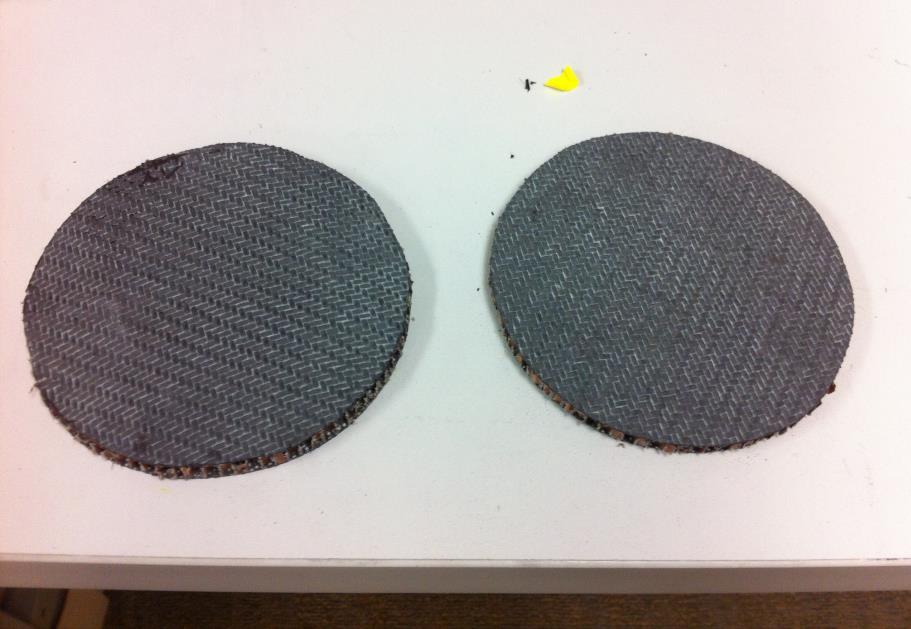 Figure 4: The fully laminated bulkheads. They are made from 2 layers of 11 oz Carbon fiber twill with a 45 degree bias.