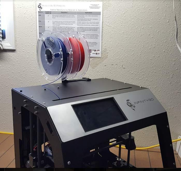 29. Install the filament spool holder stand and top with the flat facing forward. The spool holder stand is a 3D printed part which supports the filament spools during the print.