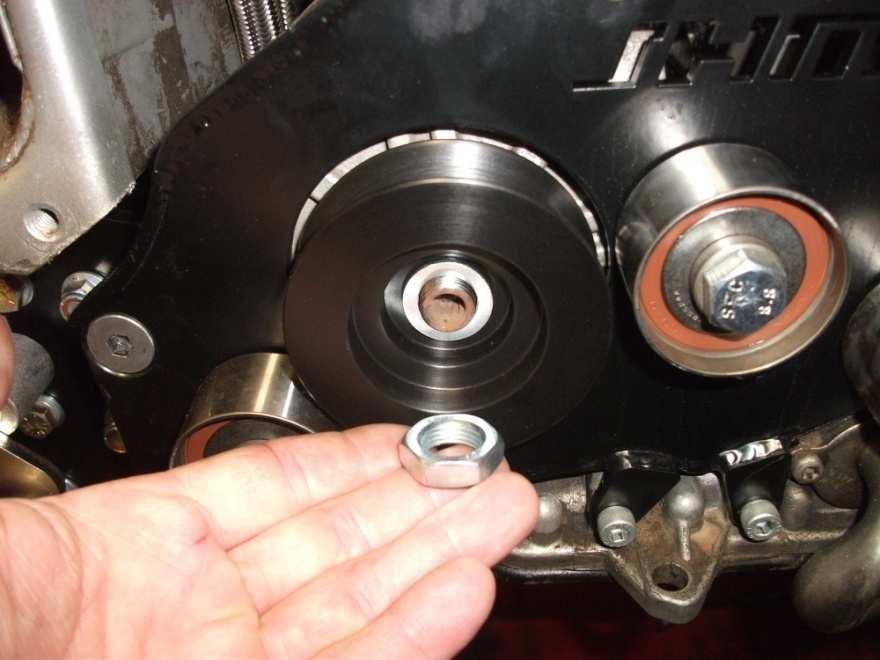 washers underneats. Torque all 5 bolts to 50nm or 30ftlbs.