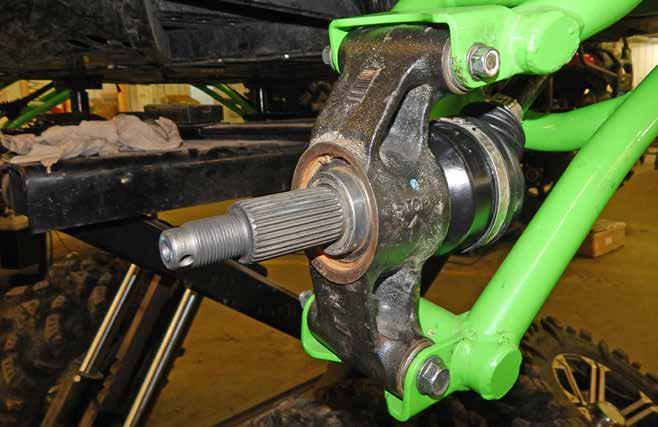 - Secure lower sections of Shocks to Rear Upper Arms with stock hardware. Do not install any Nuts until all final adjustments have been completed.