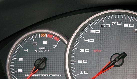 In Figure 2, a tachometer (revolution-counter, tach, rev-counter, RPM gauge) is an instrument measuring the rotation speed of a shaft or disk, as in a motor or other machine.