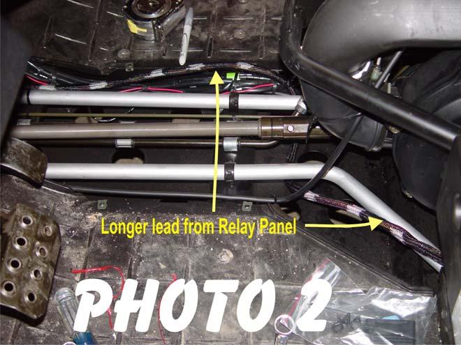 3. Routing Main Harness #00-1142 The short lead, with the (2) male plug connectors, will remain in the area under the drivers seat.
