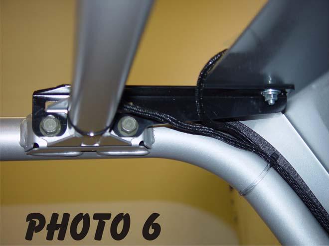 MOUNTING BRACKETS, WINDSHIELD & TOP 1. The two front windshield support brackets are located in the windshield box.