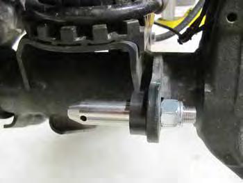 Install the longer disconnect post on the driver side axle sway bar link mount with it pointing inboard [20].
