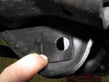 23 d. Re-install the control arm to the axle with the factory bolt with cam lock washers.