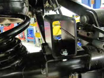 Set the length of the provided rear sway bar links with the booted joints to 11-3/4 between the ball stud centers and install to the outside of the sway bar and axle mount [7,8].