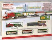 Perfect for under-the-tree in a small space and festively decorated for a very Merry Christmas, this ready-to-run set features: 0-6-0 steam locomotive and tender old-time combine two old-time coaches