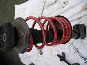 Make sure the springs are seated in their correct locations in the shock absorber.
