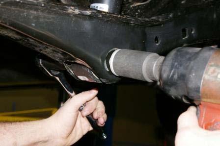 Install the brake line support bracket in its new location.