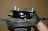 ) Remove the 21mm tie rod nut and separate tie rod
