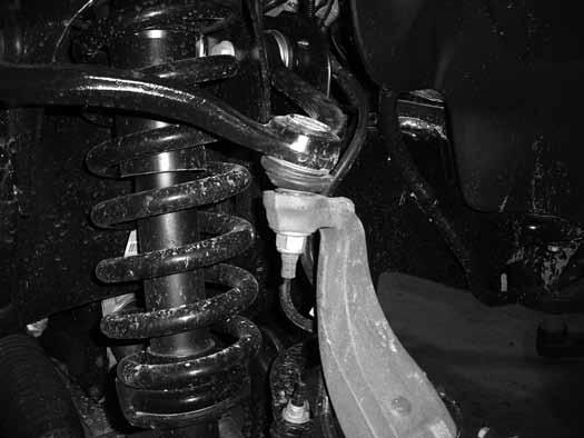 Strike the knuckle near the ball joint to dislodge it from the knuckle.