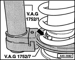 Page 11 of 16 40-48 Fig. 1 Removing coil spring - Clamp VAG1752/2 spring mounting tool in vise. - Clamp forked end of suspension strut in VAG1752/2 spring mounting tool. Fig. 2 WARNING!