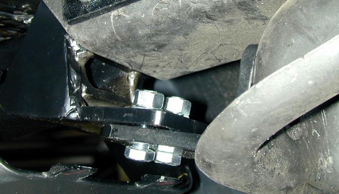 existing hole at the front of the passenger side frame rail, which was used to attach the tow hook (Fig.K).